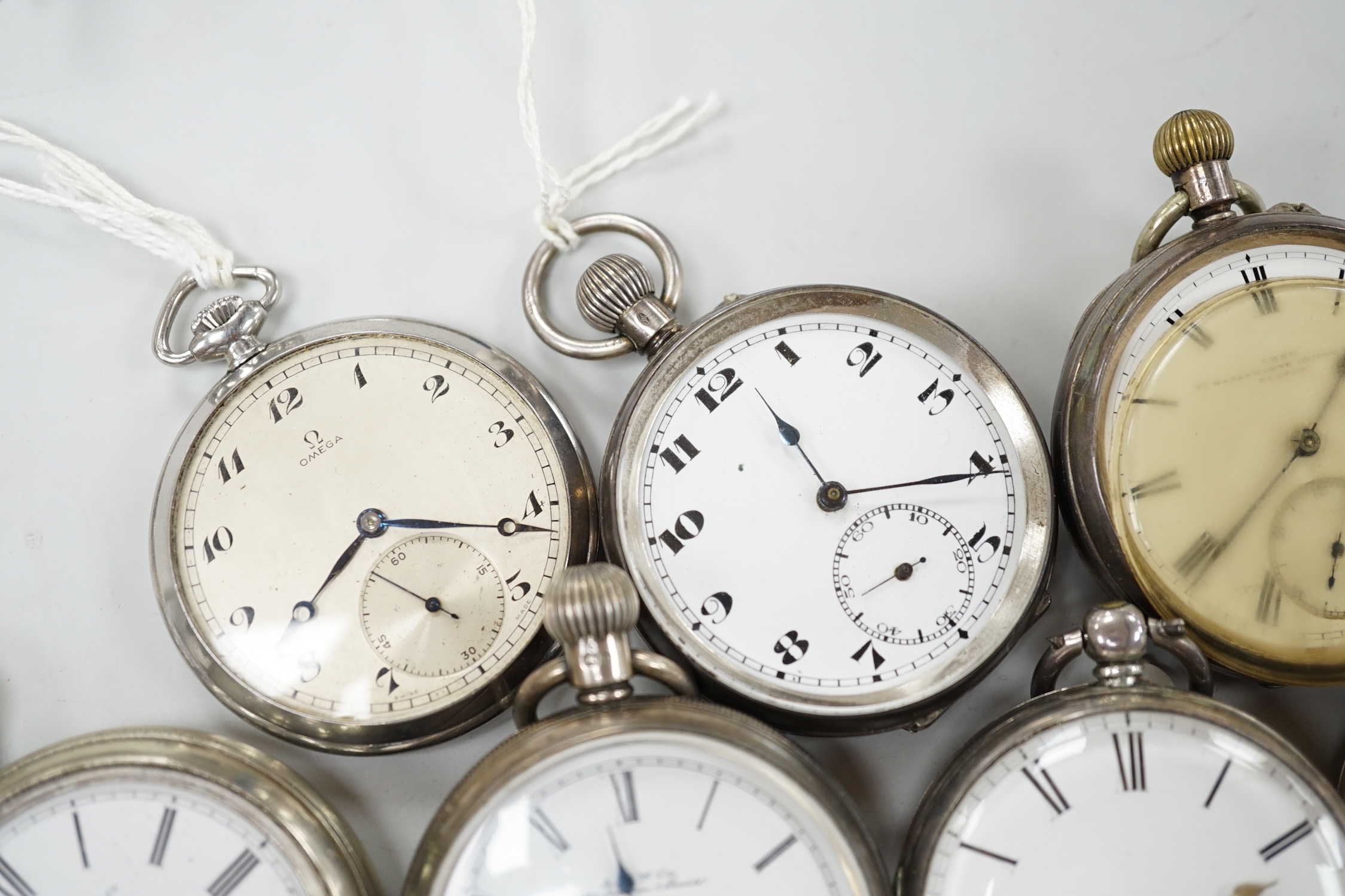 Twelve assorted silver or base metal pocket watches including chrome Omega, Searle & Co and gold plated hunter.